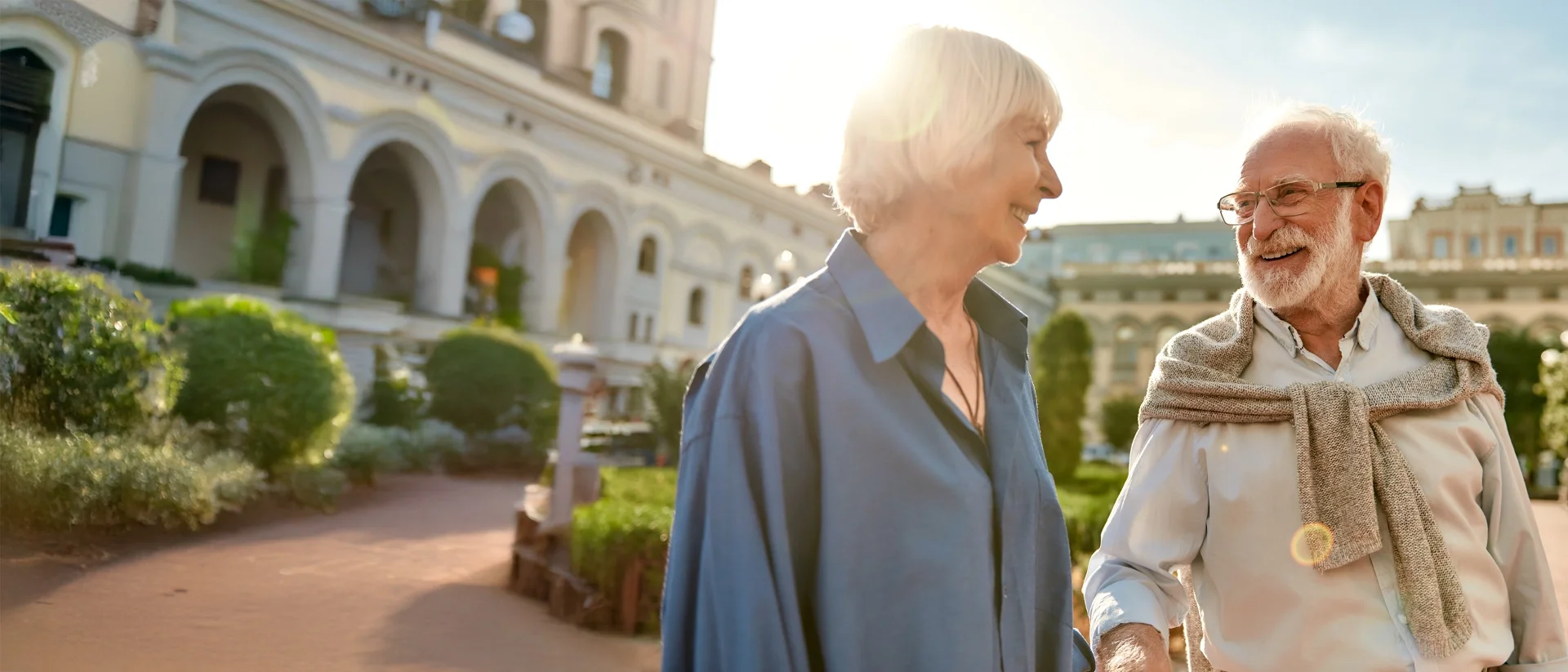 An elderly couple taking a walk