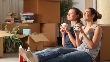 1136x794_Rental Insurance for Landlords and Tenants.jpg Two women watching television