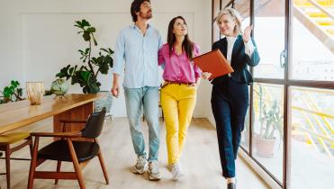 Real estate agent with couple