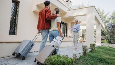A couple with suitcases